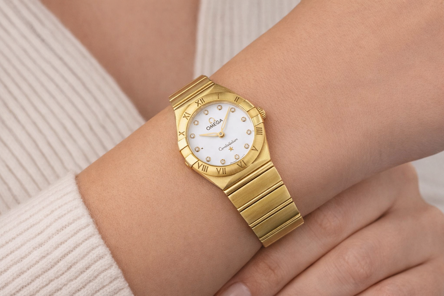 OMEGA WOMEN GOLD WHITE DIAL