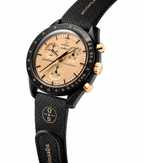 Omega x Swatch MoonSwatch black and gold watch - white background